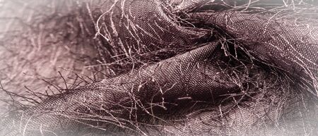 Background texture, decorative ornament, brown silk fabric, woven threads on the fabric, fluffy...