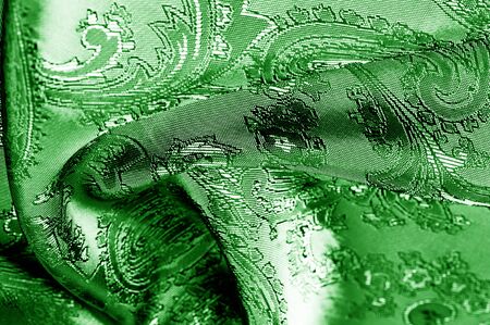 texture, background, green, verdant, lawny, vealy, virid,  blushful fabric with a paisley pattern. based on traditional Asian elementsの写真素材