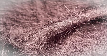 Background texture, decorative ornament, brown silk fabric, woven threads on the fabric, fluffy...