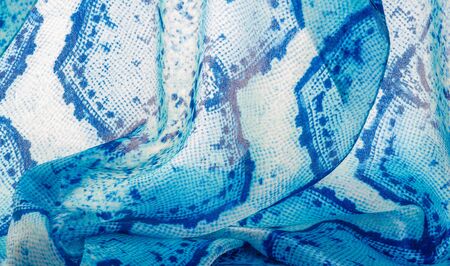 Background, texture, pattern, silk-white fabric with a pattern of blue squares of lines