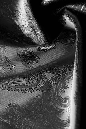 texture, background, black steel gray fabric with a paisley pattern. based on traditional Asian elementsの写真素材