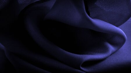 Texture, background, pattern, satin blue is a weave that usually has a glossy surface and a dull back, Satin weave is characterized by four or more filler or weft threads,の写真素材