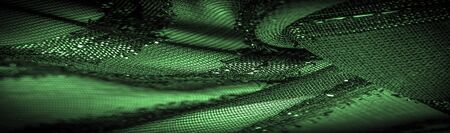 texture  background picture the fabric is transparent emerald green with brightly innate stripes, the material allowing the light to pass through it so that the objects behind are clearly visible.の写真素材