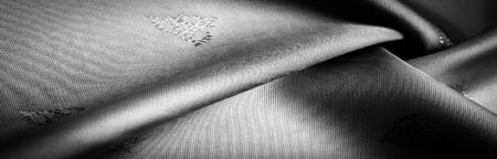 texture, background, pattern, pattern, chocolate, silk fabric, Gray black fine pattern, pattern, representing a combination of lines, colors, shadows.の写真素材