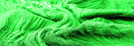 Background texture, ornament decor, emerald green centered corrugated fabric, fabric with parallel...