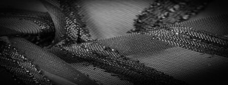 The texture of the background image,  the fabric is transparent with brightly congenital stripes, material, allowing the light to pass through it so that the objects behind are clearly visible.の写真素材