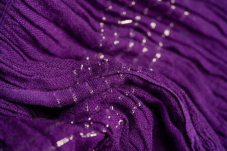 Texture background pattern, decor ornament, dark lilac corrugated fabric of blue cent, Fabric with parallel or diagonal folds of dentate folds; products from such a fabric.の写真素材