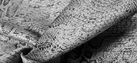 Texture, background, pattern, fabric with a pattern of gray snake skin, African fabric, design photo...