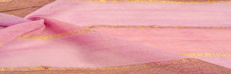 Textural pattern background, ornament, background, silk fabric, large stripes of pink and cinnamon, separated by a strip of gold, this fabric will decorate your design, you will be the bestの写真素材