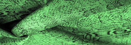 Texture, background, pattern, fabric with a green snake skin pattern, African fabric, designer photo...