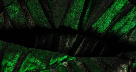 texture. background. pattern. wallpaper. black silk fabric with blue emerald stripes, wrinkled fabricの写真素材