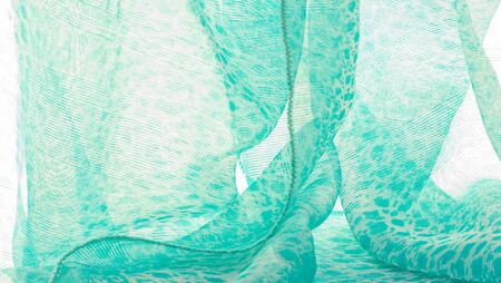 The texture, background, pattern, green white silk fabric is textile. Its properties differ from woven material in that it is more flexible and simple in design.の写真素材