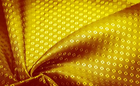 Background texture, decorative ornament, yellow gold silk fabric, with small prints, wealth, riches, richness, rich, fortune,の写真素材