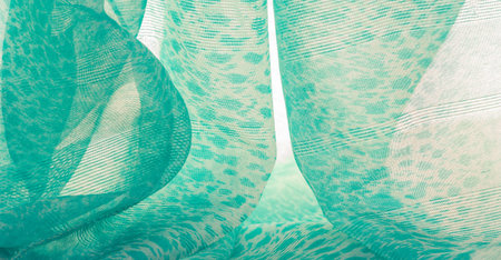 The texture, background, pattern, green white silk fabric is textile. Its properties differ from...