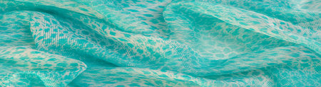 The texture, background, pattern, green white silk fabric is textile. Its properties differ from...