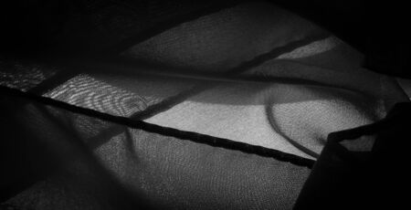 Texture, background, pattern, satin black is a weave that usually has a glossy surface and a dull back, Satin weave is characterized by four or more filler or weft threads,の写真素材