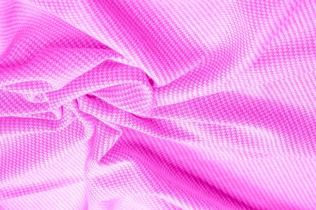 Background texture, pattern Fabric warm wool with a stitched red thread. This one makes us want to curl a fireplace with a mug of hot chocolate. His ultra-soft and fuzzy hand is an open knit designの写真素材