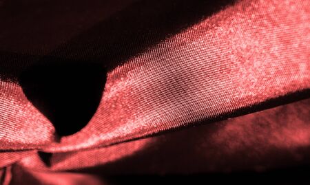 Background texture, pattern, dark red, silk fabric, decorative design.の写真素材