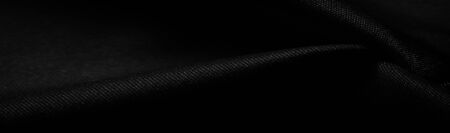 Texture, background, pattern, black silk fabric, this is silk satin weaving. Differs in density, smoothness and gloss of the front side, softness, it is well draped. Use design, projectsの写真素材