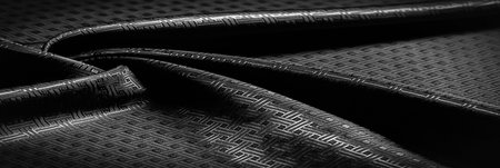 Background texture, pattern. Black silk fabric with a small checkered pattern. You do not need smoke...
