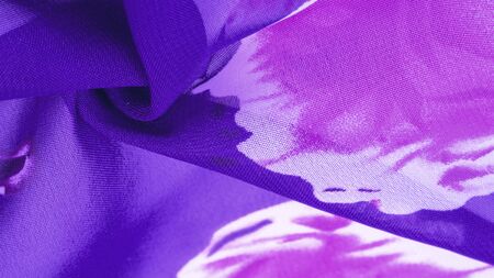 Texture, background, blue silk fabric with a red floral print. Your projects are developed in our studio by designers who have deep knowledge in the use of their final product.の写真素材