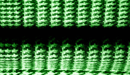 Background texture pattern. The fabric is thick, warm with a checkered pattern green This soft...