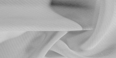 texture background pattern of white silk fabric. This silk organza has a gentle open weave. Use this...