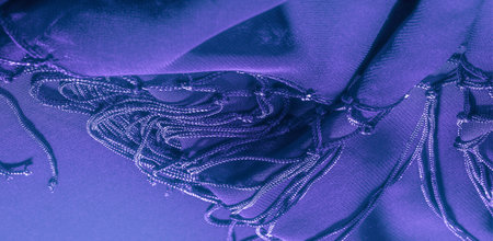 Background texture of silk fabric. This is a natural purple blue scarf, this beautiful nylon satin...