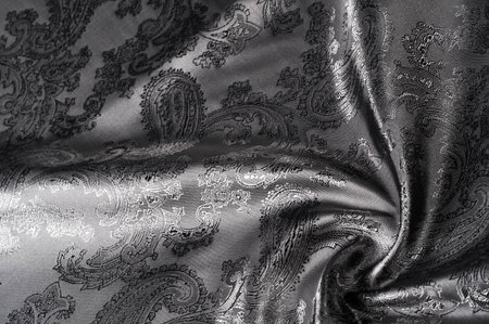 texture, background, black steel gray fabric with a paisley pattern. based on traditional Asian...