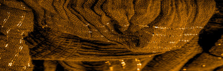 The texture of the background pattern, ornament decor, golden yellow corrugated fabric, fabric with...