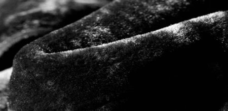 The background texture, pattern, sheepskin are used to make leather goods made of sheepskin and soft woolen clothes or coverings on the lining, including gloves, hats, slippers, footboards for feet,の写真素材