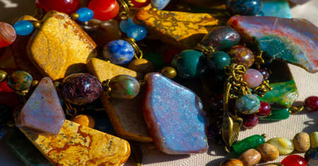Texture, background, pattern. Folk art. Beads from multi-colored stones and glassの写真素材