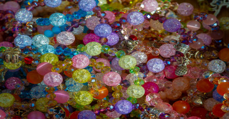 Texture, background, pattern. Folk art. Beads from multi-colored stones and glassの写真素材