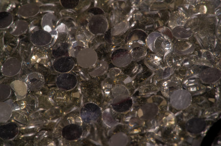 Sequins have a flat round shape. They are used in many needlework techniques, such as embroidery,...