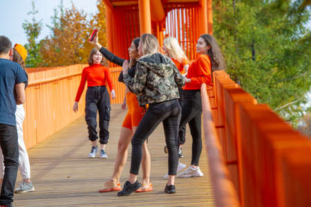 Dance group makes a video clip, girls in different clothes, cheerful mood, Russia Tatarstan Naberezhnye Chelny 14 07 2019のeditorial素材