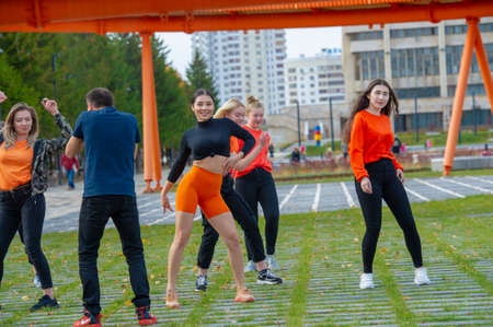Dance group makes a video clip, girls in different clothes, cheerful mood, Russia Tatarstan Naberezhnye Chelny 14 07 2019のeditorial素材