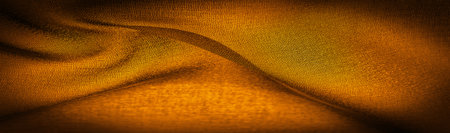 Dark sepia brown-yellow chiffon silk is a soft transparent fabric with a slight roughness (matte, crepe) due to the use of twisted yarn. Background textureの写真素材