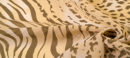 silk fabric in brown and white stripes, zebra skin in African style. Repeating striped background...