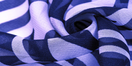 silk fabric, blue and white abstract lines. The magical shape of an abstract blue and white pattern....