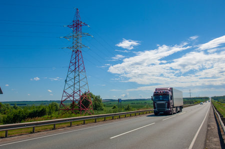 summer photography, trucks driving, river bridge over the river, Russia Tatarstan Menzilinsk 2019 06 25のeditorial素材