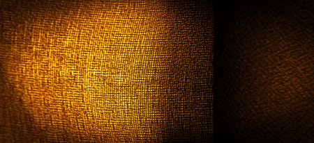 Dark sepia brown-yellow chiffon silk is a soft transparent fabric with a slight roughness (matte, crepe) due to the use of twisted yarn. Background textureの写真素材
