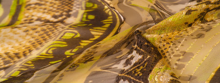 silk fabric, green-brown, abstract background luxury cloth or liquid wave or wavy folds of grunge...