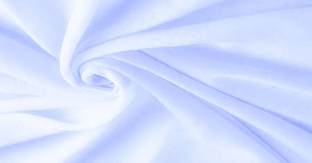 Blue cloth, abstract background of luxury fabric or liquid silk texture of waves or wavy folds. background or elegant wallpaper design. Cotton texture, natural fabric and dye, bright blue colorの写真素材