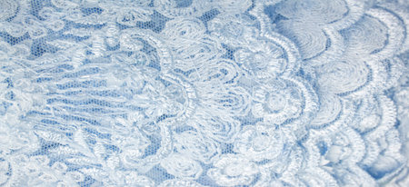 The lace is light blue. Texture. background. template. abstract background with pale blue rod, old lace and sapphire lines. can be used for postcard, poster, texture or wallpaperの写真素材