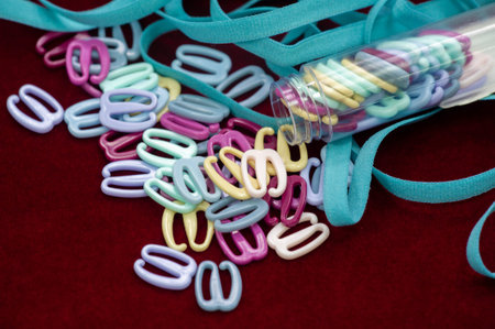 Elastic braid and elastic bands, accessories for sewing lingerie. Text, background, pattern