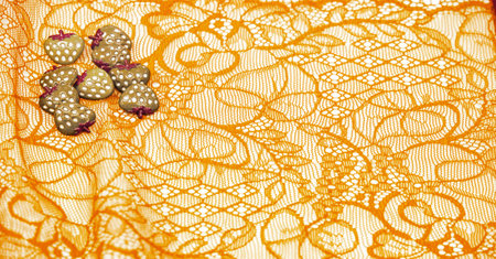 Yellow lace fabric. Royal yellow lace patch with haute couture decoration, accessories for your design, couture ribbon, bright decoration. Texture Background Patternの写真素材
