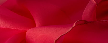 Texture. Background. Pattern. Red silk folded fabric background, banner or cover design. luxurious textile decoration backdrop for poster, Scarlet drapery material with soft satin waves, poster,の写真素材