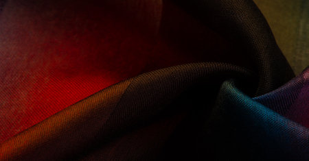 The silk scarf is dark in color. Green red blue blurred stripes. Delicate long gradient color stole, soft hand feeling, stylish and comfortable. The scarf will add sophistication to your look.の写真素材