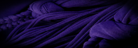 Texture, background, pattern. Fabric in blue braids. Knitted jersey background with a relief...