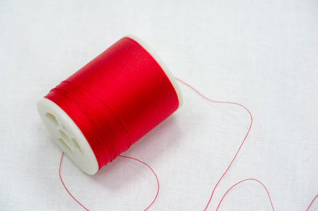 A thread is a continuous strand (made of fibers or threads twisted together), a long, thin strand of...